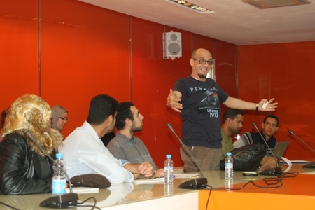 Ayman Salah welcomes attendees to Hacks/Hackers Rabat.